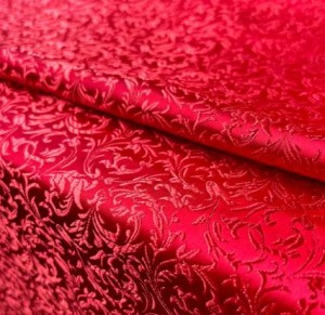 Red Jacquard Fabric with a Delicate Flowing Pattern (note: width 28")