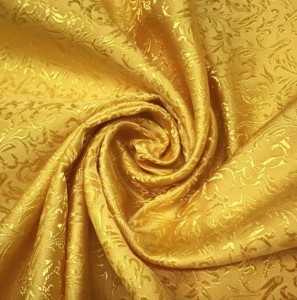 Bright Gold Jacquard Fabric with a Delicate Flowing Pattern (note: width 28")