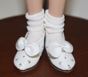 41mm  White Slip On Shoes with Bow shown on Anne