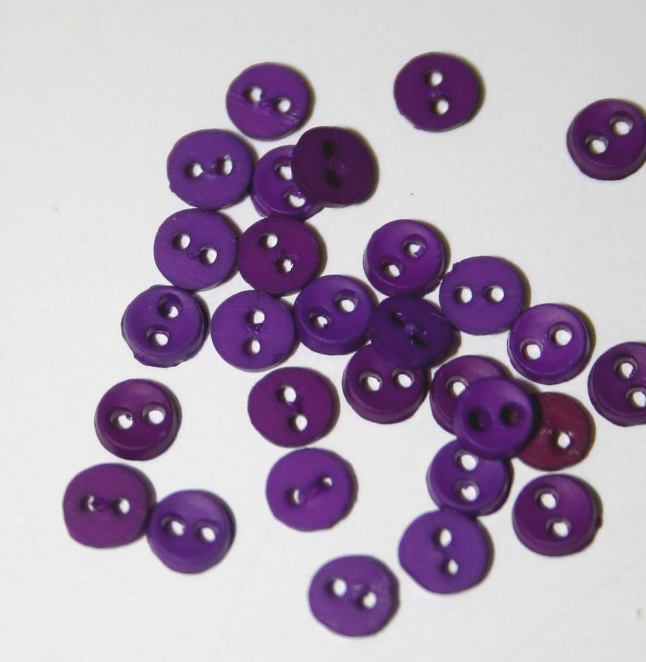 dark purple buttons